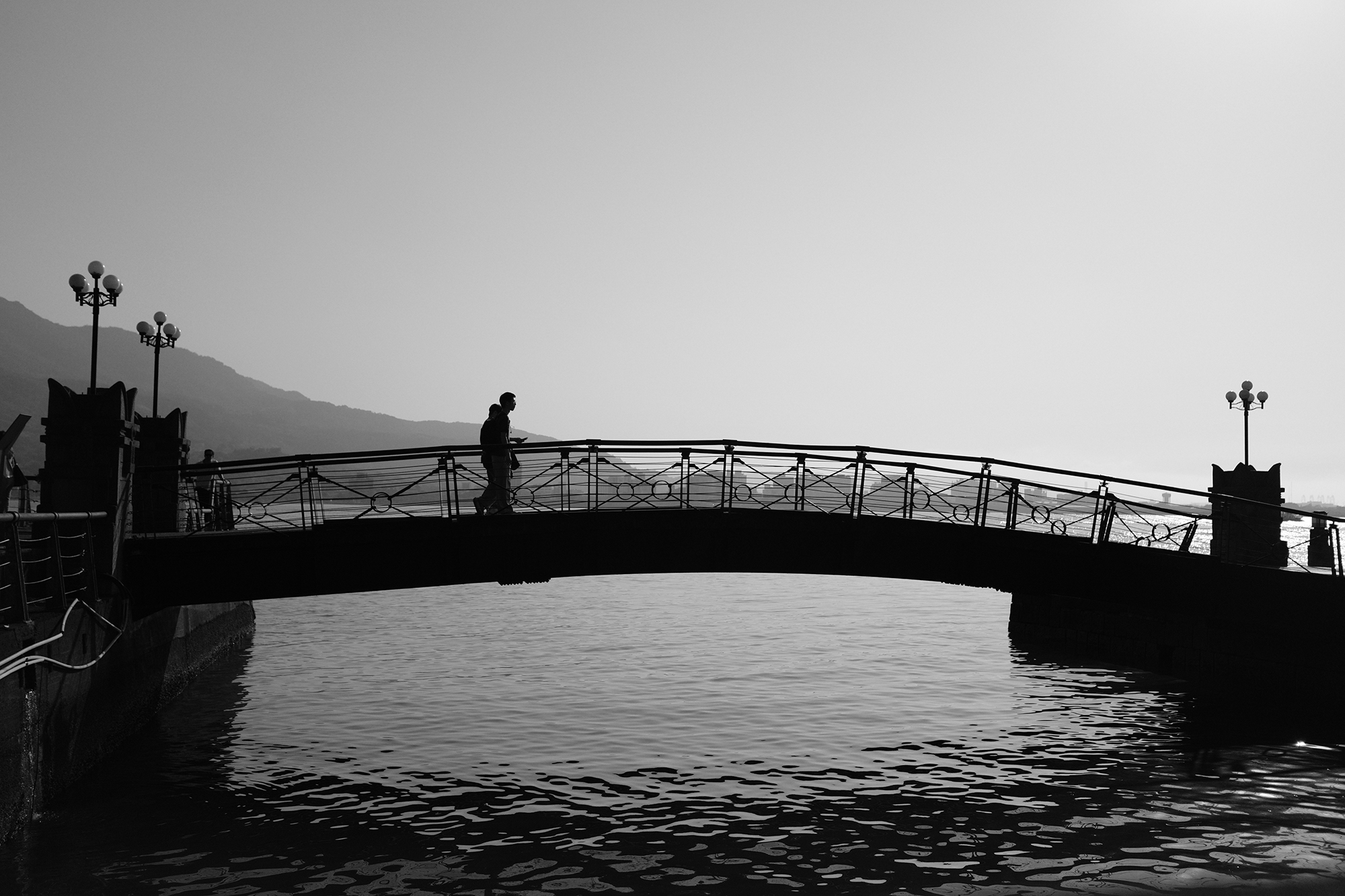 Black and white waterfront silhouettes and river light - TAMSUI project cover
