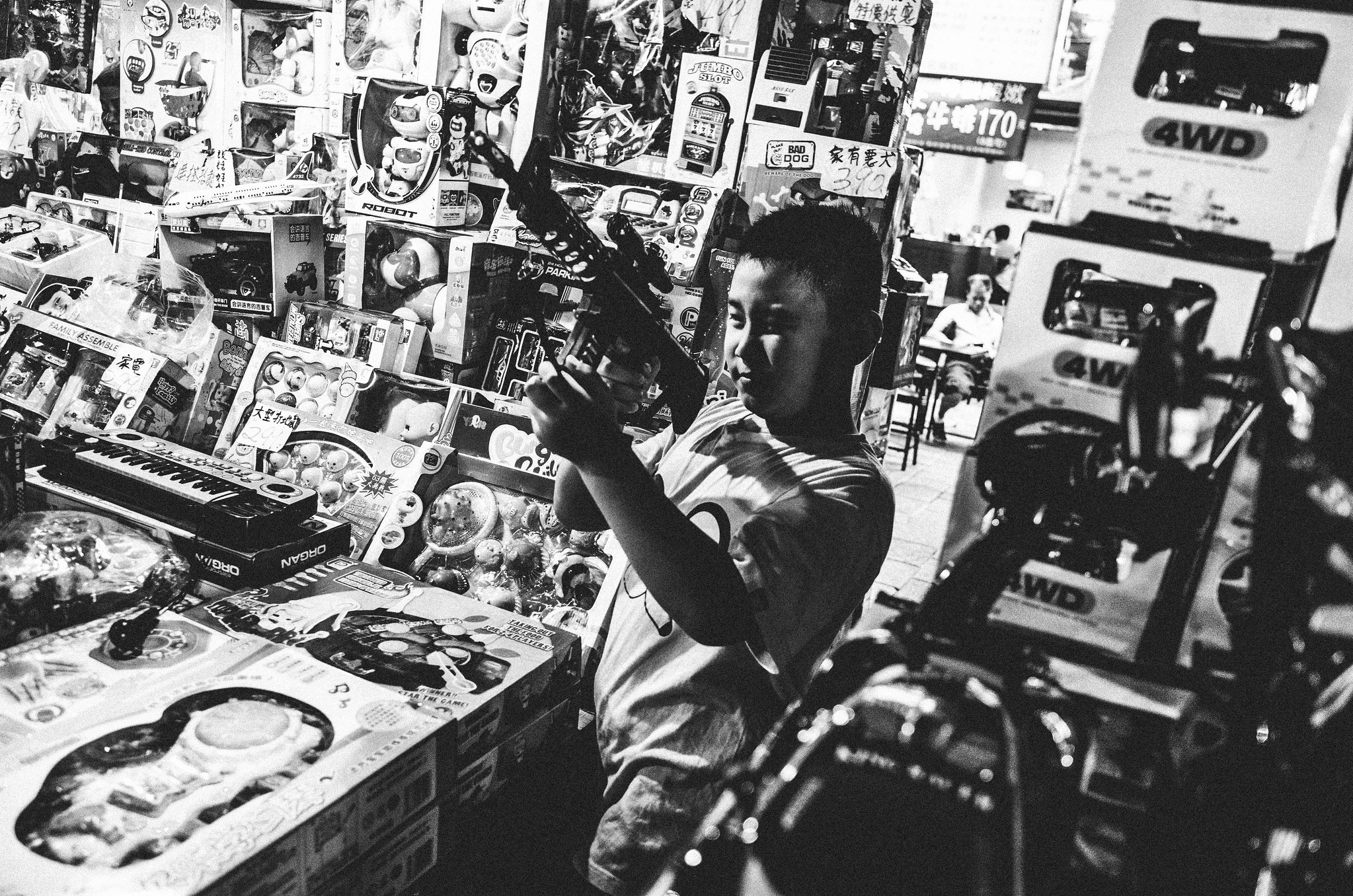 Candid low-light street photograph highlighting local character and mood in Wanhua, Taipei